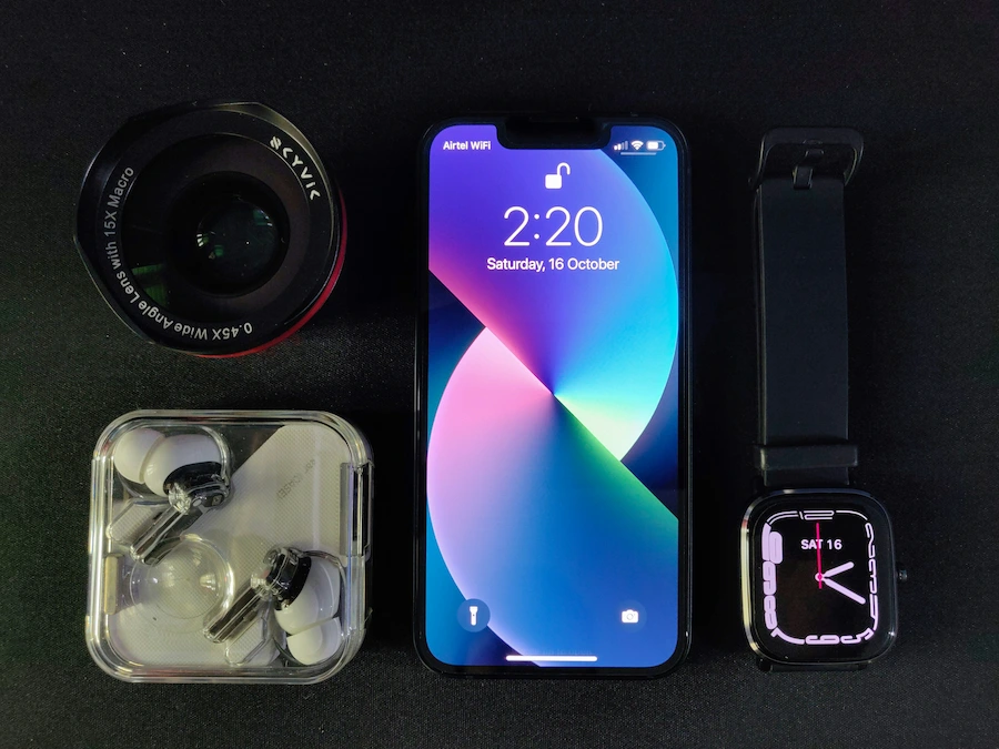 A cell phone with a couple of accessories