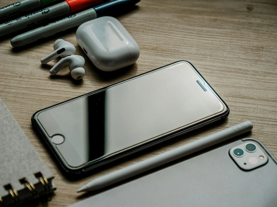 2 phones with ear buds, diary and some other items